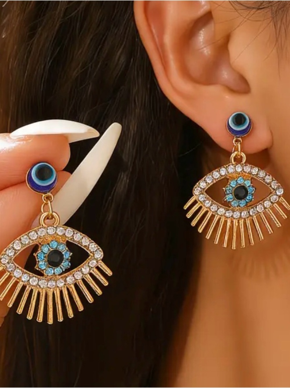 Gold Eye Drop Earrings with Blue Accent